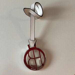 Henri Bendel silver and cream leather bag charm